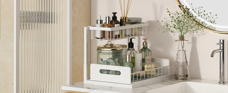 White L-shaped organizer with toiletries on a bathroom vanity
